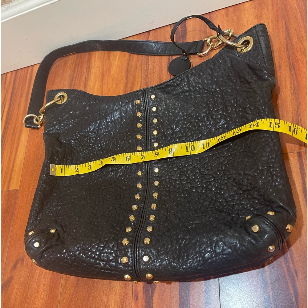 Michael Kor handbag used. Bag in great condition, with beautiful stones.